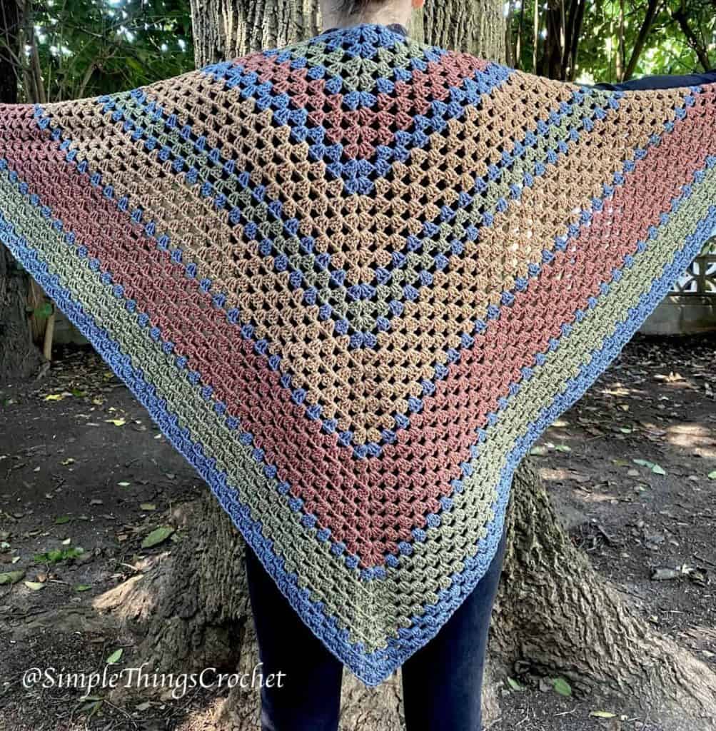 Finished crochet Autumn Woods Wrap triangle shawl in Stone Wash, Caper, Raisin and Nutmeg