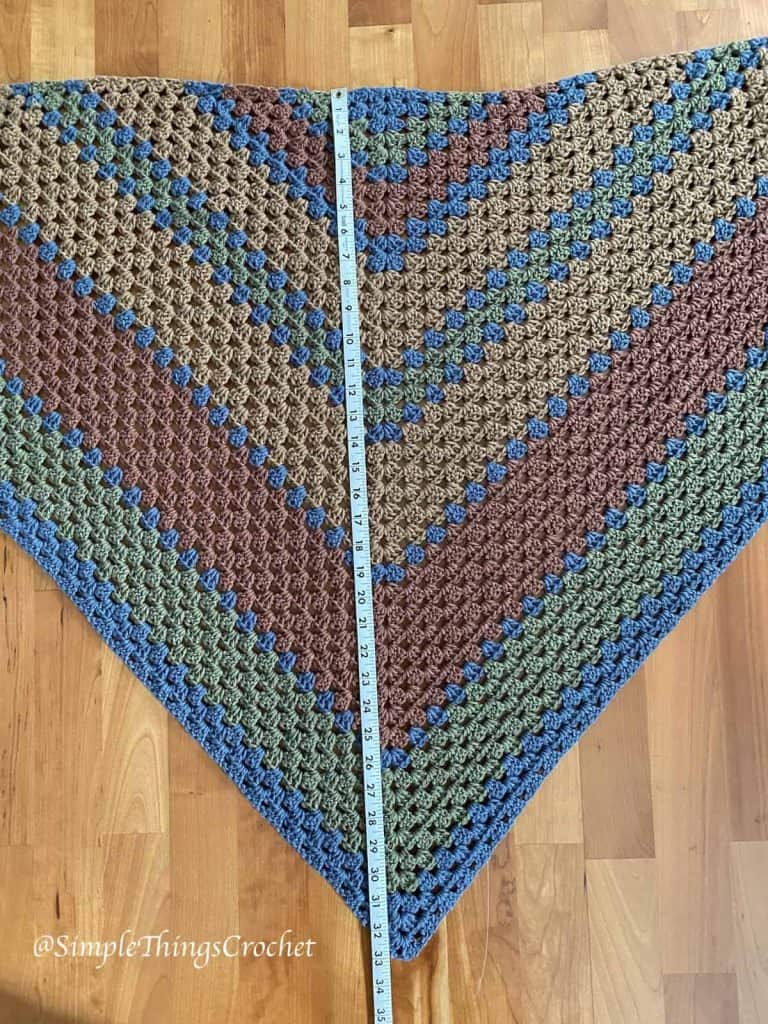 Crochet Autumn Woods Wrap triangle shawl laid flat showing its full size